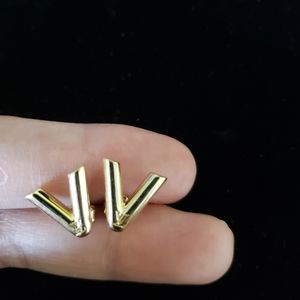 Solid 18K yellow gold  LV Volt stud earrings- Brand new